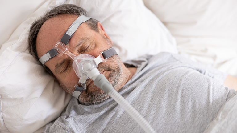Obstructive sleep apnea in adults - sleeping patient (male) 4